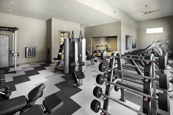 24-Hour fitness center with modern equipment and fitness on demand™ kiosk